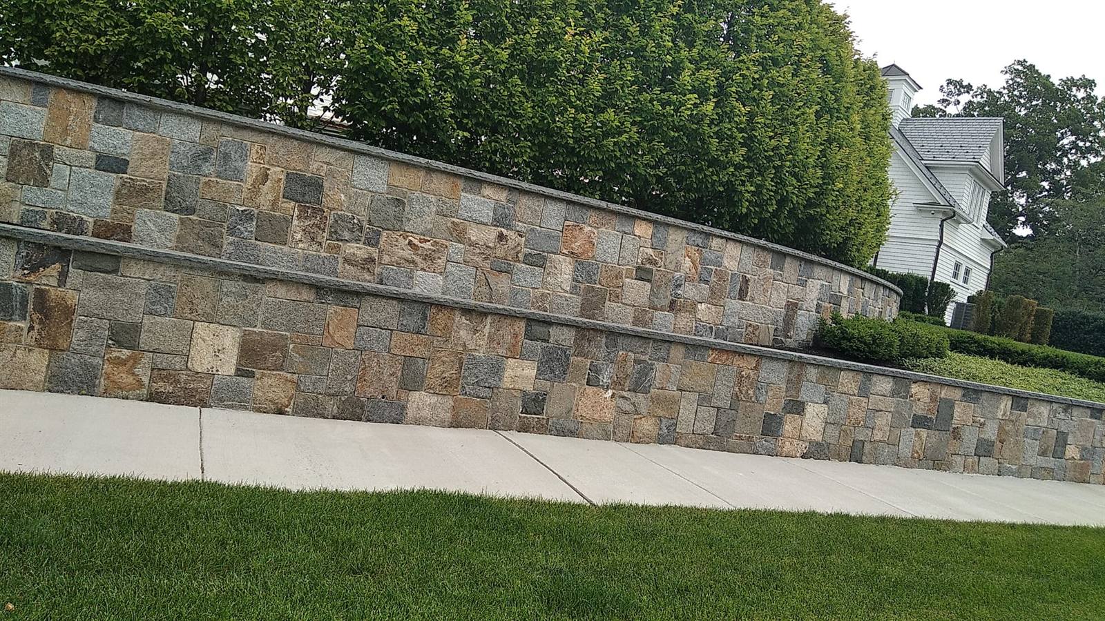 Curved stone veneer wall, Massachusetts